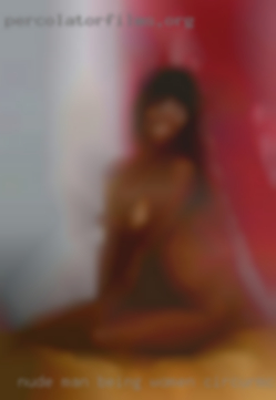 Nude man being women circurmcised.